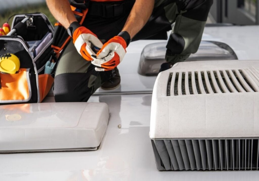 Technician showing clear repair quote to RV owner at their doorstep