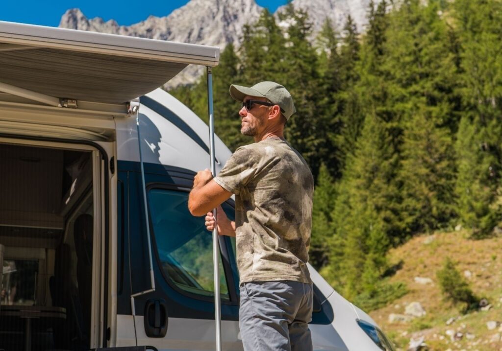 Customer reviewing clear mobile RV repair quote with technician